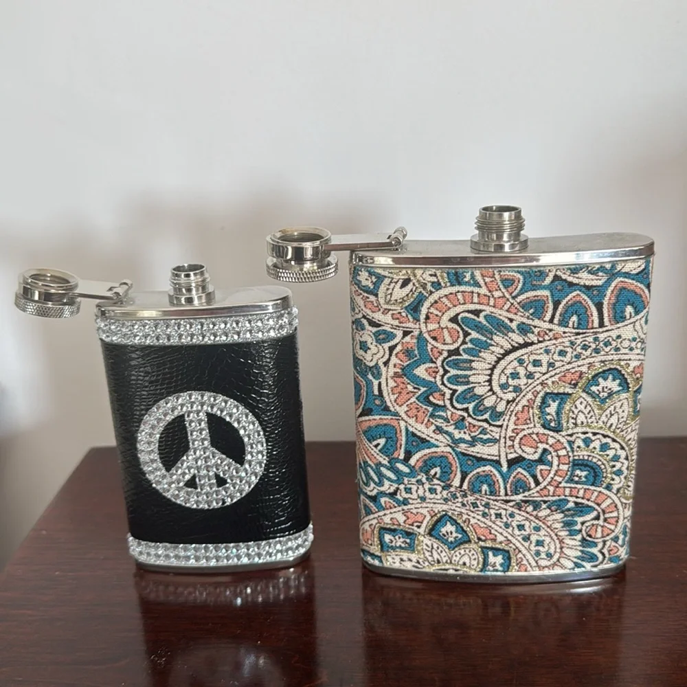 2 stainless steel flasks. Peace sign with rhinestones from ZGallerie.